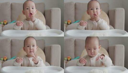 可爱亚洲小孩用手抓白米饭吃高清在线视频素材下载