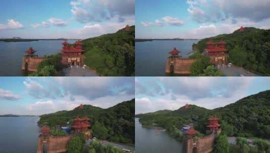航拍武汉5A级旅游景区东湖与楚城古城楼高清在线视频素材下载