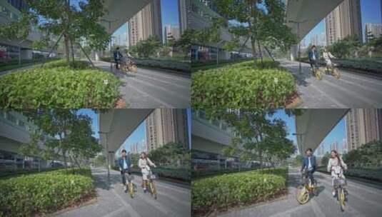 一对情侣在马路上骑自行车慢动作高清在线视频素材下载