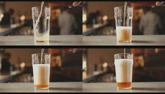 吧台上倒啤酒倒入杯中啤酒泡沫自酿啤酒高清在线视频素材下载