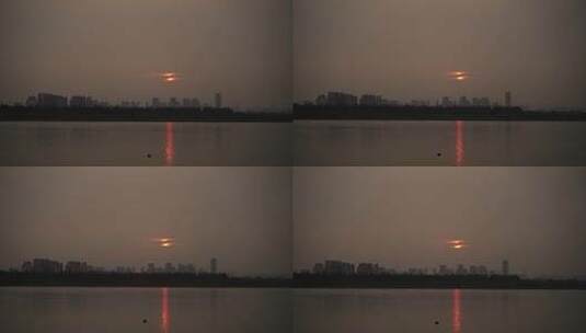 江滨城市日出日落剪影水面阳光波光粼粼高清在线视频素材下载