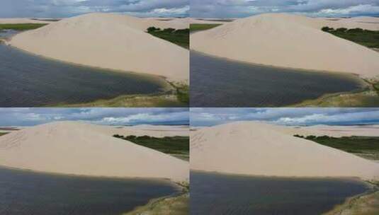 风景优美的沙丘和雨水湖高清在线视频素材下载