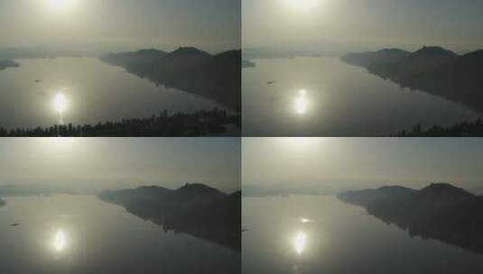 航拍武汉东湖磨山傍晚太阳湖面倒影高清在线视频素材下载
