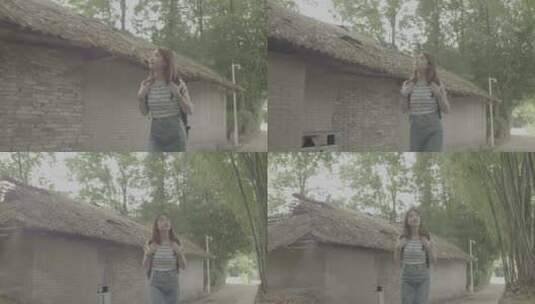 女孩漫步竹林欣赏古老乡村田间风景灰片高清在线视频素材下载