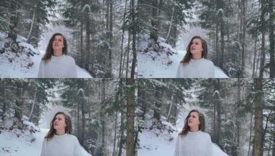 雪下的时候，女人走路扔了一片森林。快乐年高清在线视频素材下载