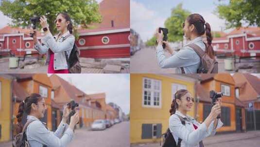 亚洲女性旅行者在城市旅行时使用相机记录v高清在线视频素材下载