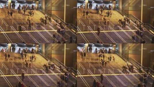 夜晚人们在通往公共交通站台的楼梯行走高清在线视频素材下载