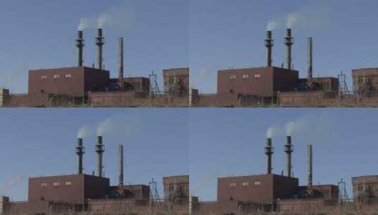工厂的烟囱冒出白烟高清在线视频素材下载