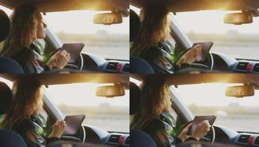 女人在车里使用平板电脑高清在线视频素材下载