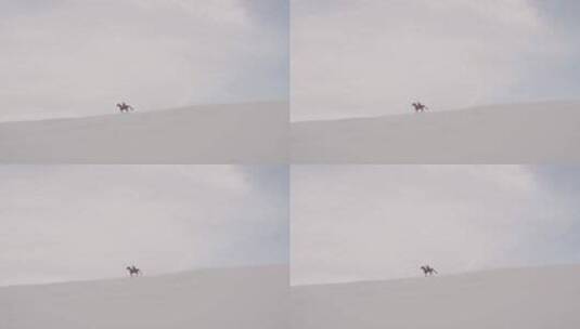 人骑马在穆斯林沙漠行走高清在线视频素材下载