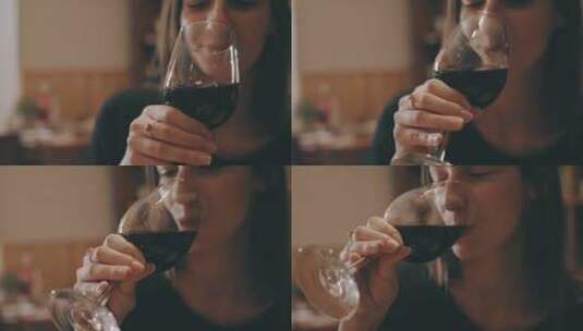 女人喝红酒微笑高清在线视频素材下载