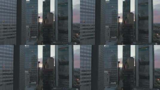 在摩天大楼和建筑物之间飞翔高清在线视频素材下载