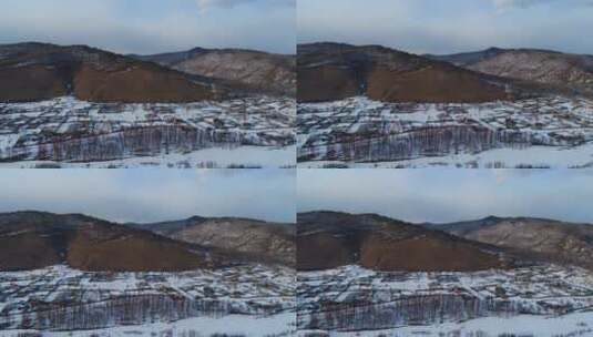 航拍大兴安岭春雪中的山里人家高清在线视频素材下载