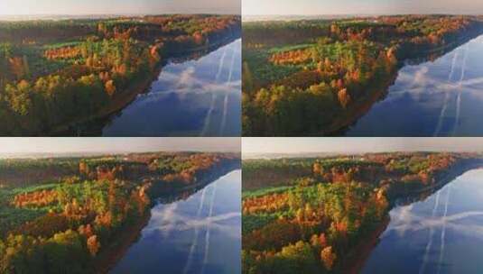 鸟瞰蓝色湖泊和秋天的森林高清在线视频素材下载