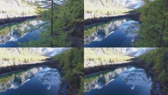 亚丁 雪山湖面倒影 航拍高清在线视频素材下载