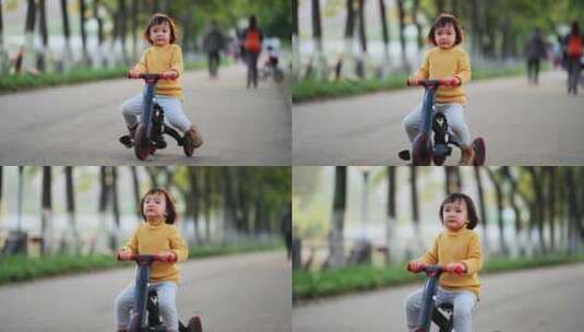 小女孩在公园里骑车玩耍慢镜头高清在线视频素材下载