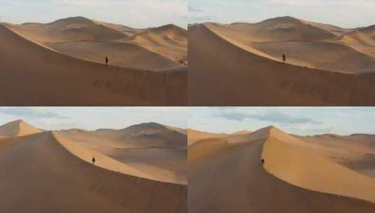 航拍沙漠徒步旅行者高清在线视频素材下载