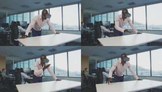非裔美国商人在现代办公室戴着VR耳机高清在线视频素材下载