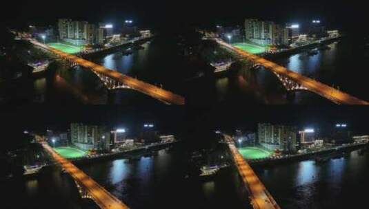 航拍夜晚大桥与足球场-藤县高清在线视频素材下载
