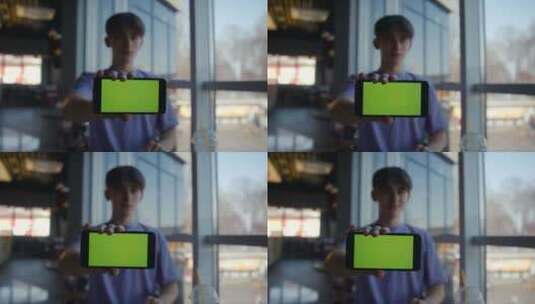 男人展示智能手机显示屏高清在线视频素材下载