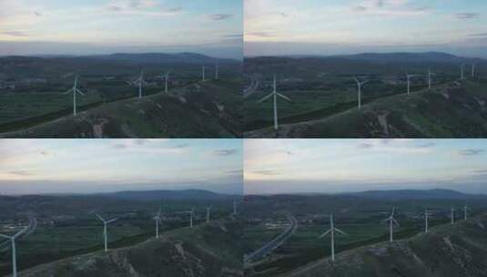 傍晚山脊上的新能源风车高清在线视频素材下载