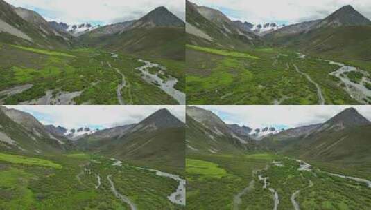 航拍川西格聂山区阿萨贡格雪山草原风光高清在线视频素材下载