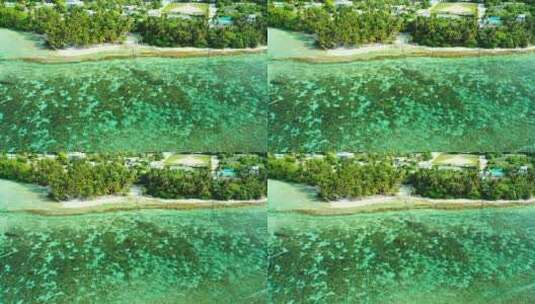 白沙天堂海滩和水绿松石水背景的日间空中旅行拍摄高清在线视频素材下载