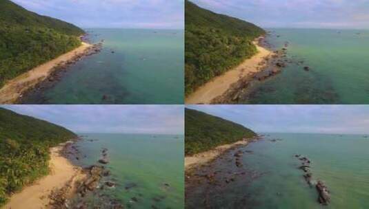 航拍海南三亚大小洞天灯塔椰林海浪礁石沙滩高清在线视频素材下载