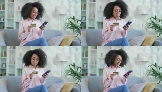 快乐的年轻非裔美国女性在网上购物，在电话高清在线视频素材下载