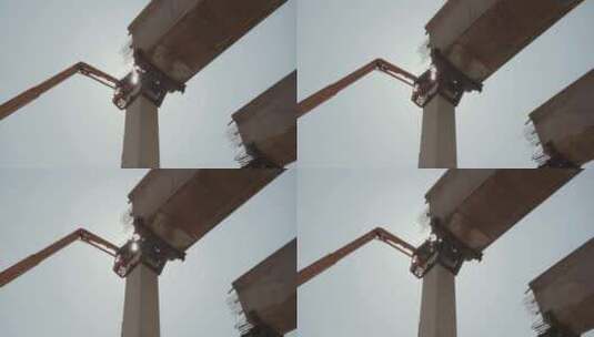 吊杆升降机在建筑工地周围移动人员高清在线视频素材下载