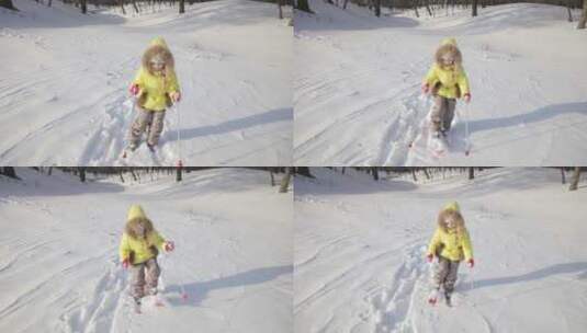 小女孩穿着滑雪板行走高清在线视频素材下载