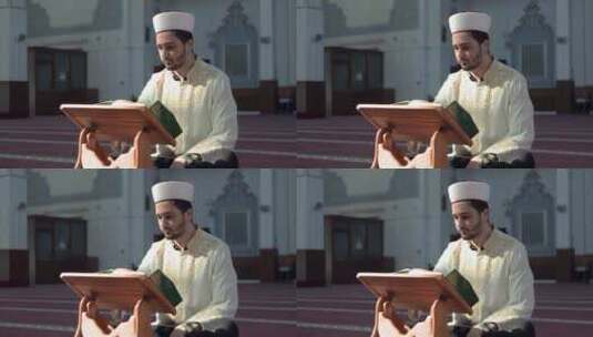 阅读古兰经的男人高清在线视频素材下载