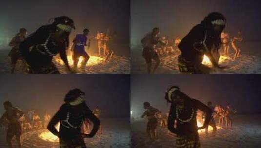 非洲部落舞者在西非的篝火前随着鼓的节奏跳舞高清在线视频素材下载