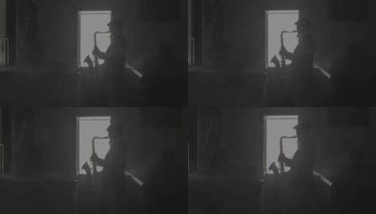 萨克斯管演奏者在黑暗的房间里演奏高清在线视频素材下载