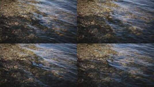 河水冲刷岸边的石头高清在线视频素材下载