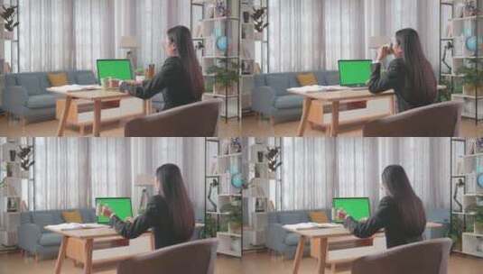 女士疫情在家隔离工作拍实视频会议绿幕素材高清在线视频素材下载