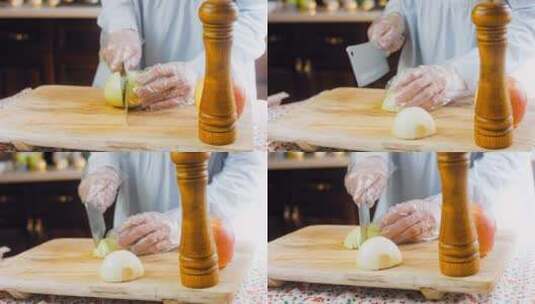 厨师切洋葱的特写镜头高清在线视频素材下载