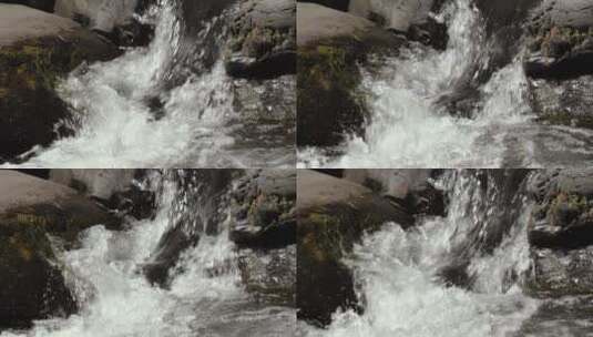 水在岩石间碰撞高清在线视频素材下载