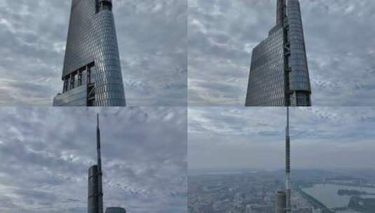 航拍蓝天白云下的紫峰大厦高清在线视频素材下载