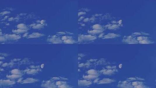 蓝天中的云朵经过月亮高清在线视频素材下载