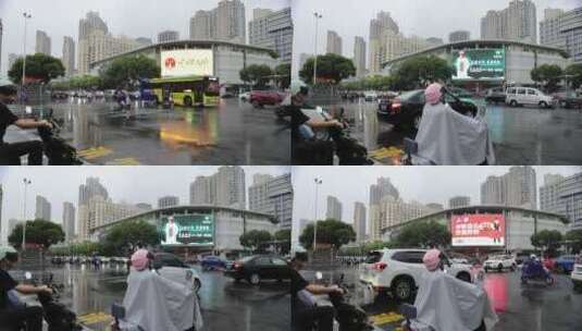 雨天的无锡十字路口车辆行人高清在线视频素材下载