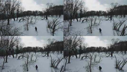 4K冬天冰天雪地人物在雪地艰难行走下雪高清在线视频素材下载