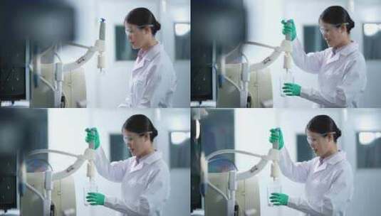 女性科学家在生化实验室做科研试验高清在线视频素材下载