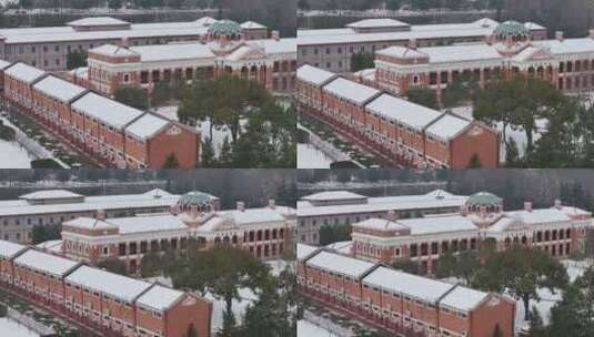 武汉航拍黄鹤楼古建筑雪景下雪红楼高清在线视频素材下载