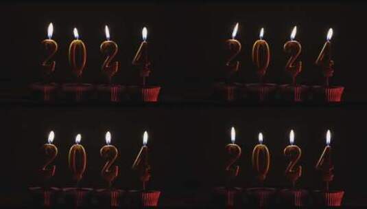 黑暗中2024字样蜡烛在燃烧高清在线视频素材下载