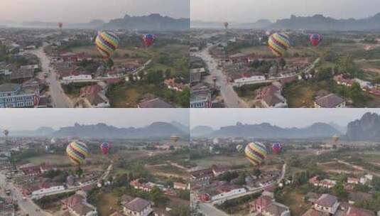 老挝万荣早晨升空的热气球运动高清在线视频素材下载