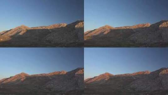 无树简单山脉中的日落阴影高清在线视频素材下载