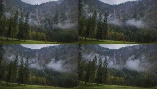 云在森林上移动，山下有瀑布延时高清在线视频素材下载