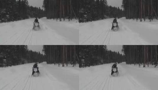 行驶上雪地里的雪地摩托车高清在线视频素材下载
