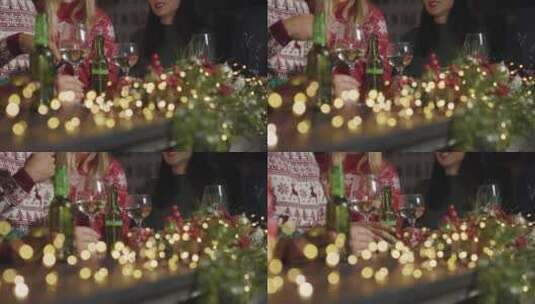 圣诞节庆祝期间朋友坐在酒吧喝酒高清在线视频素材下载
